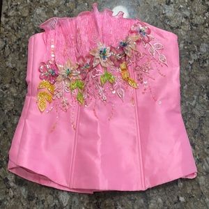 Pink embroidered corset with embroidery